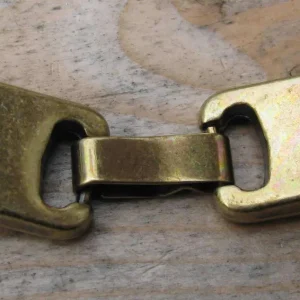 Lås bronsfärgat - Haklås för platta breda band 10x2,5mm, 1 place